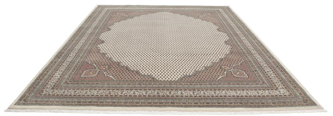 A large rectangular hand-knotted Sarouk Mir rug from India in shades of brown and beige.
