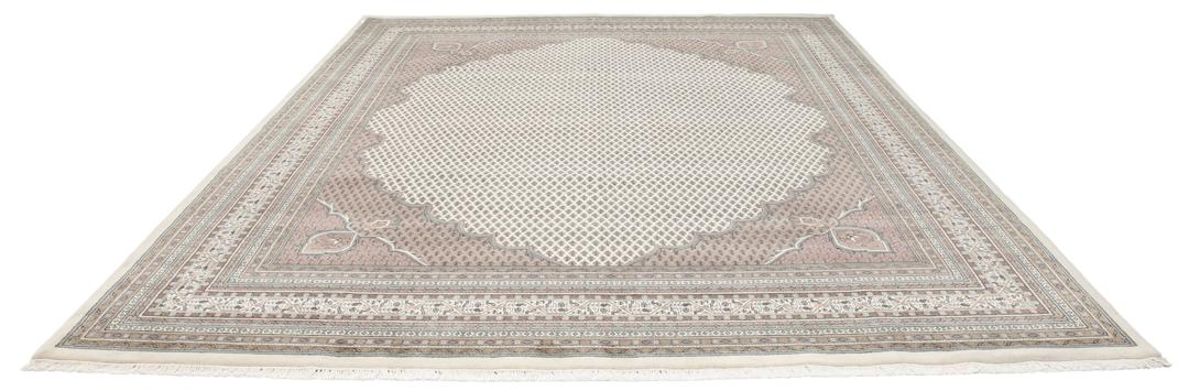A large rectangular hand-knotted Sarouk Mir rug from India in shades of brown and beige.