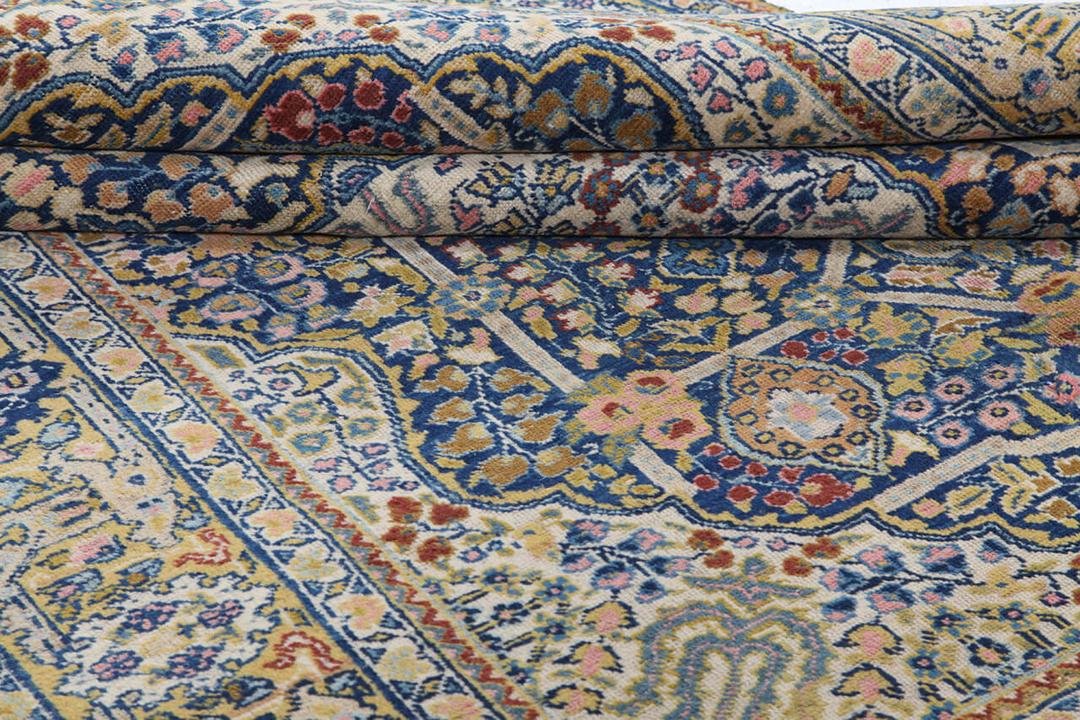 Håndknyttet Tabriz-tæppe fra Mellemøsten i blå og beige nuancer