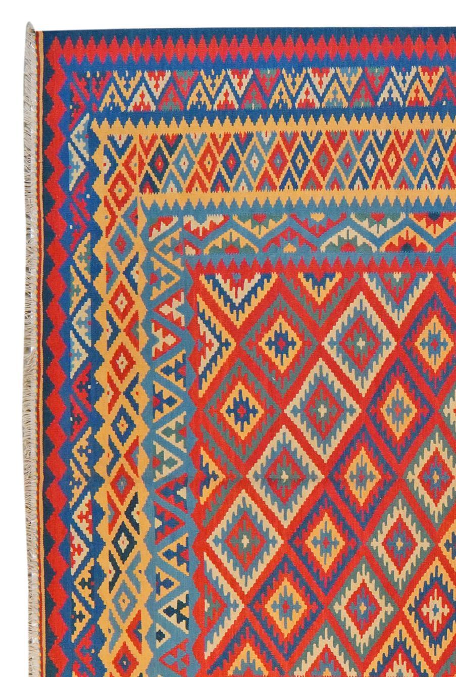 Håndvævet Kilim Qashqai-tæppe med levende geometriske mønstre i flere farver fra Mellemøsten