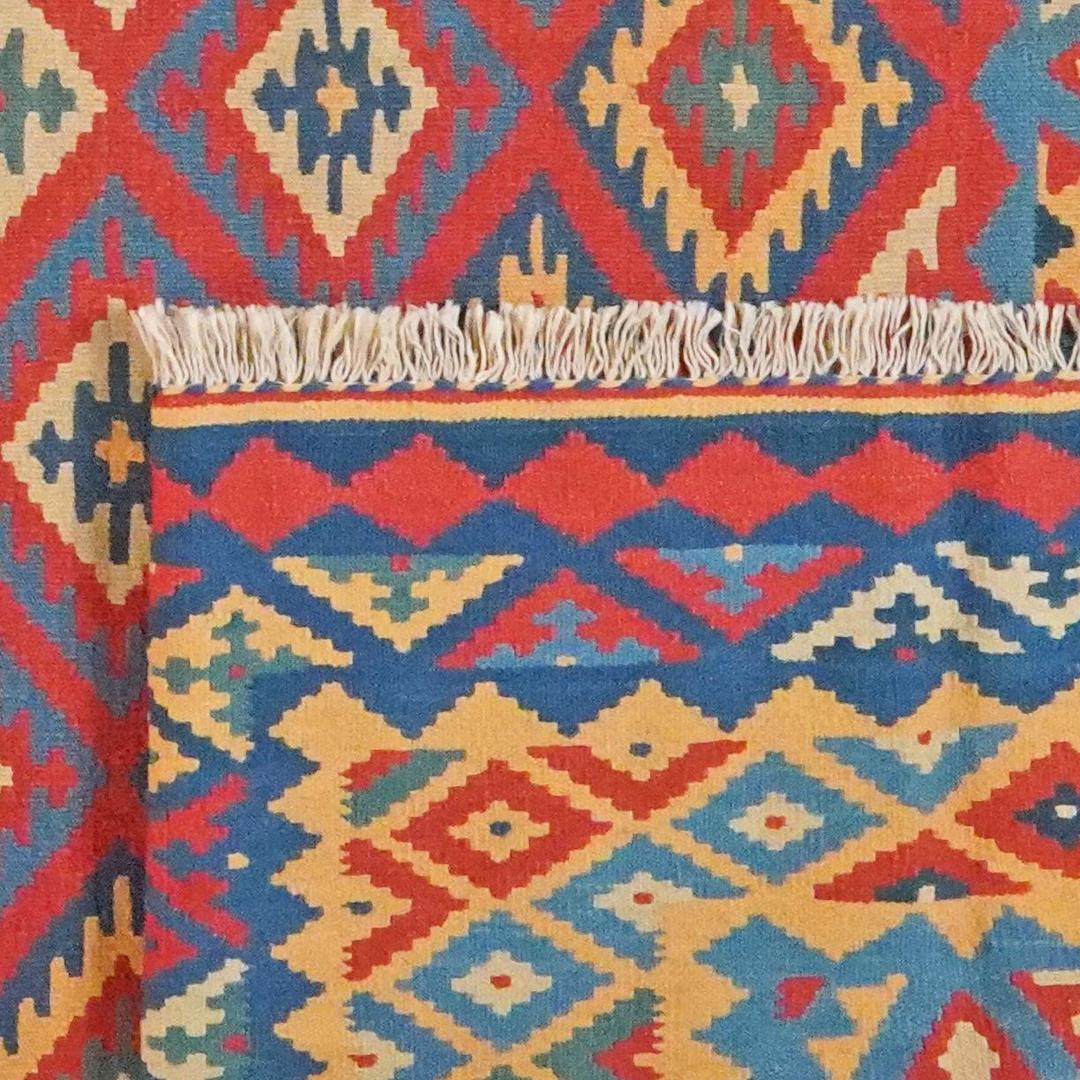 Håndvævet Kilim Qashqai-tæppe med levende geometriske mønstre i flere farver fra Mellemøsten