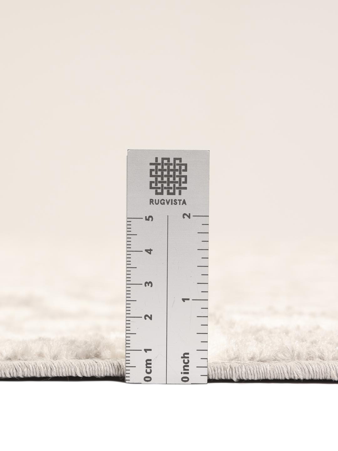 Tapis rond en gris clair et blanc