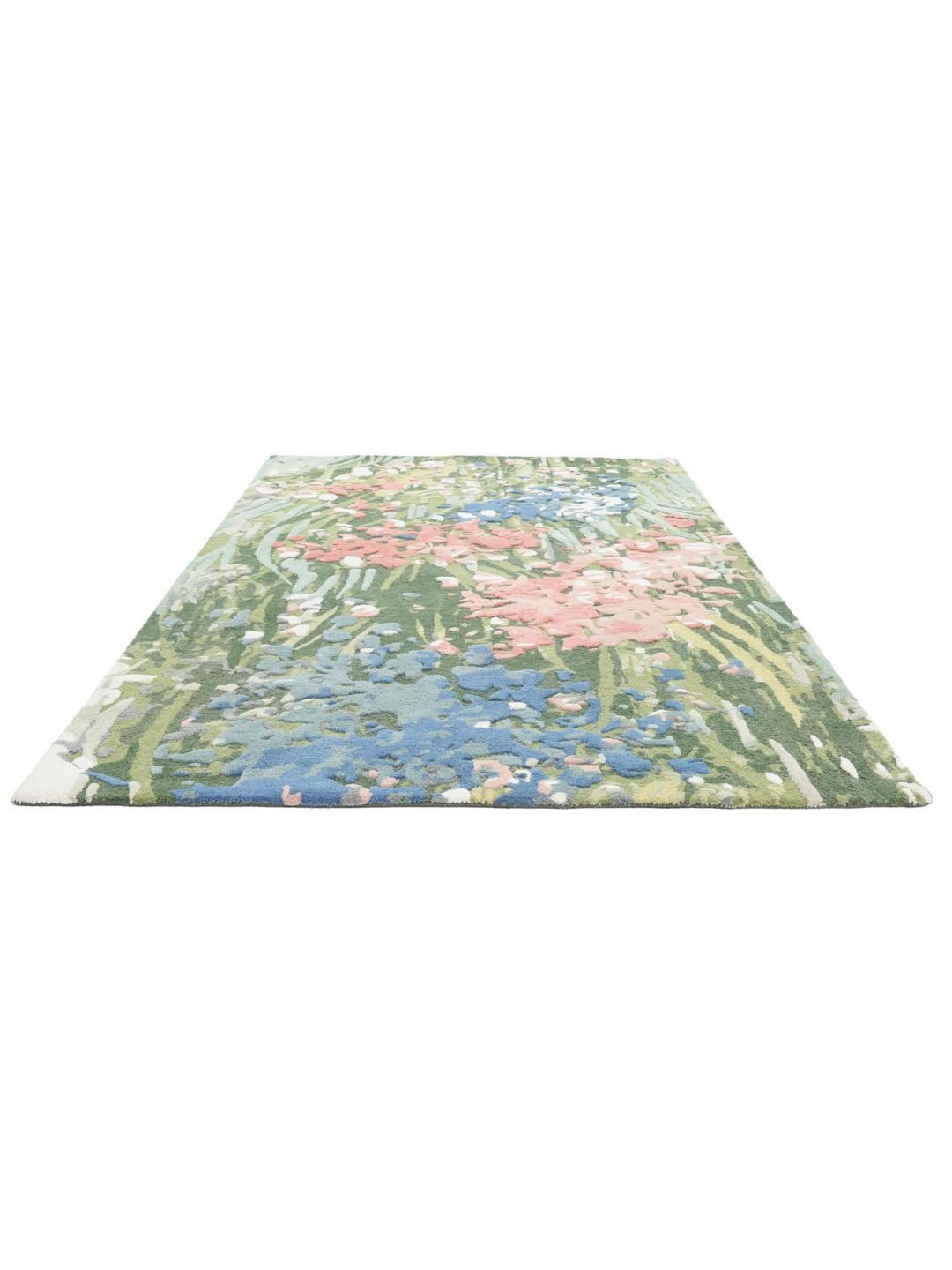 Veelkleurig tapijt met een bloemendesign in wol