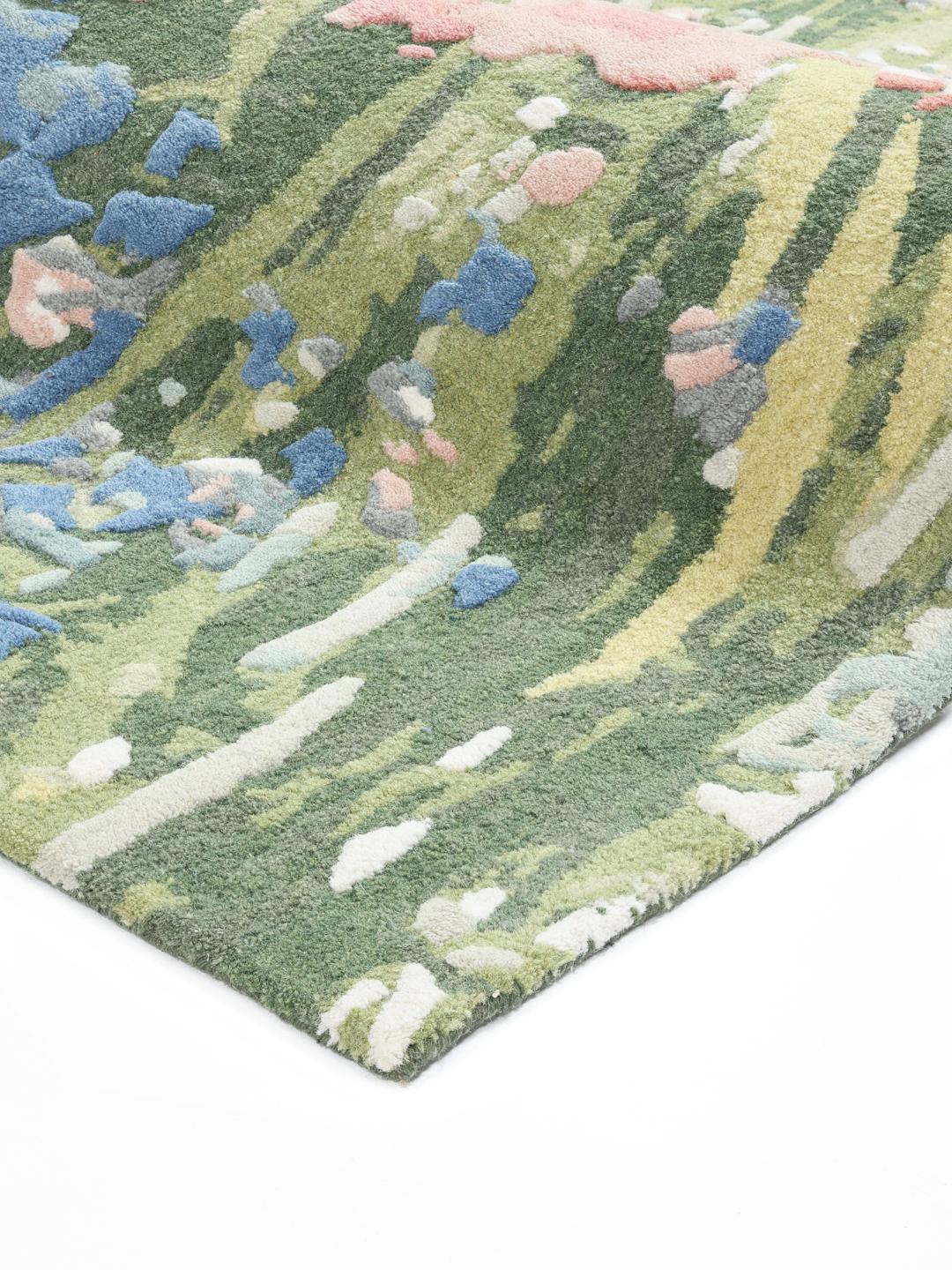 Veelkleurig tapijt met een bloemendesign in wol