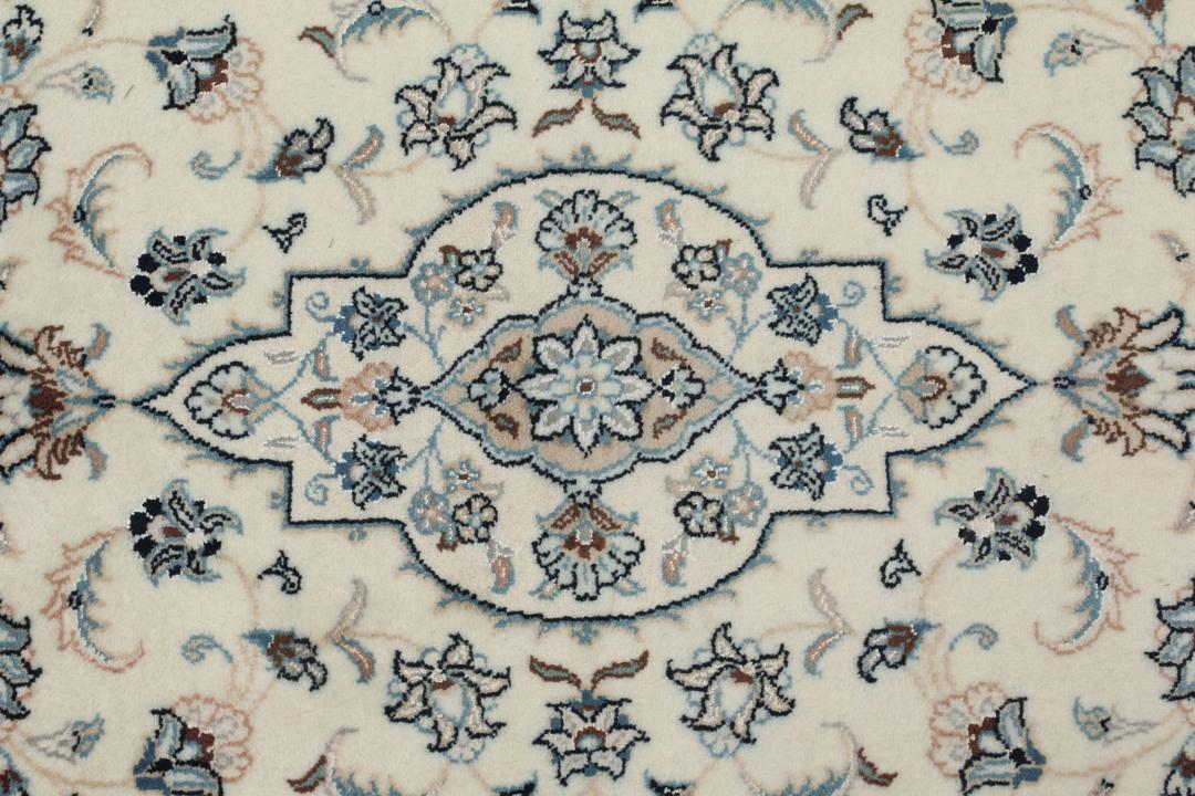 Met de hand geknoopt Nain 9La tapijt uit het Midden-Oosten in beige met bloemmotieven.
