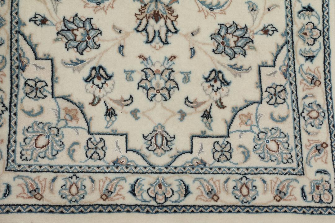 Met de hand geknoopt Nain 9La tapijt uit het Midden-Oosten in beige met bloemmotieven.