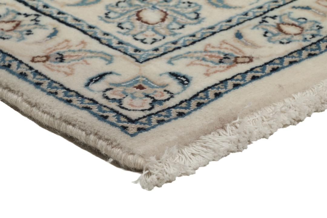 Met de hand geknoopt Nain 9La tapijt uit het Midden-Oosten in beige met bloemmotieven.