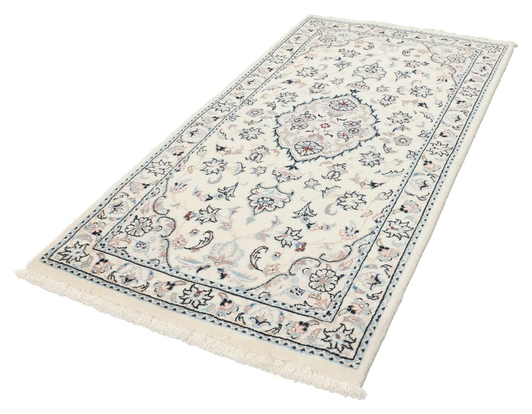 Hand-knotted Nain 9La rug from the Middle East in beige with intricate floral patterns