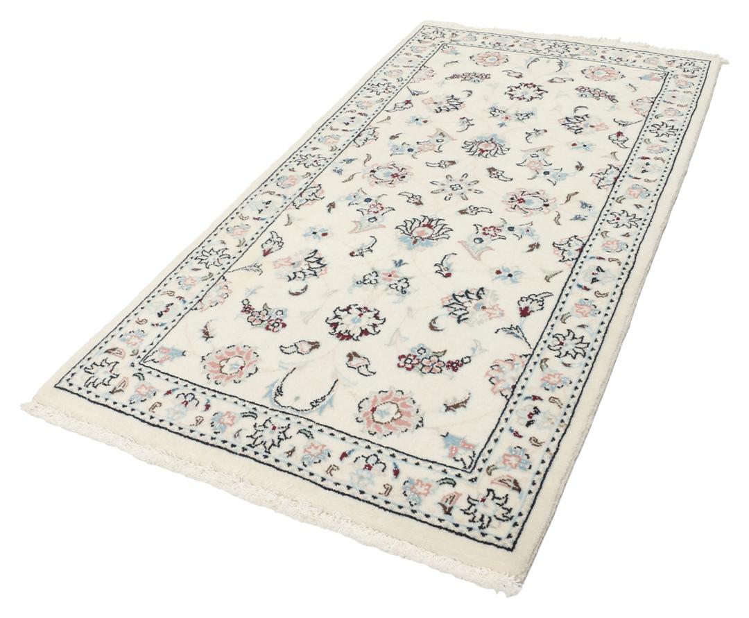 A rectangular Nain 9La rug from the Middle East with a beige background and floral motifs