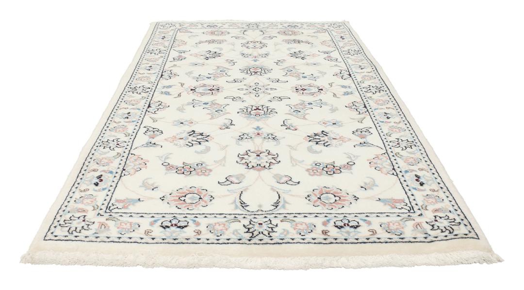 Handgemaakt Nain 9La tapijt met bloemmotief op een beige achtergrond