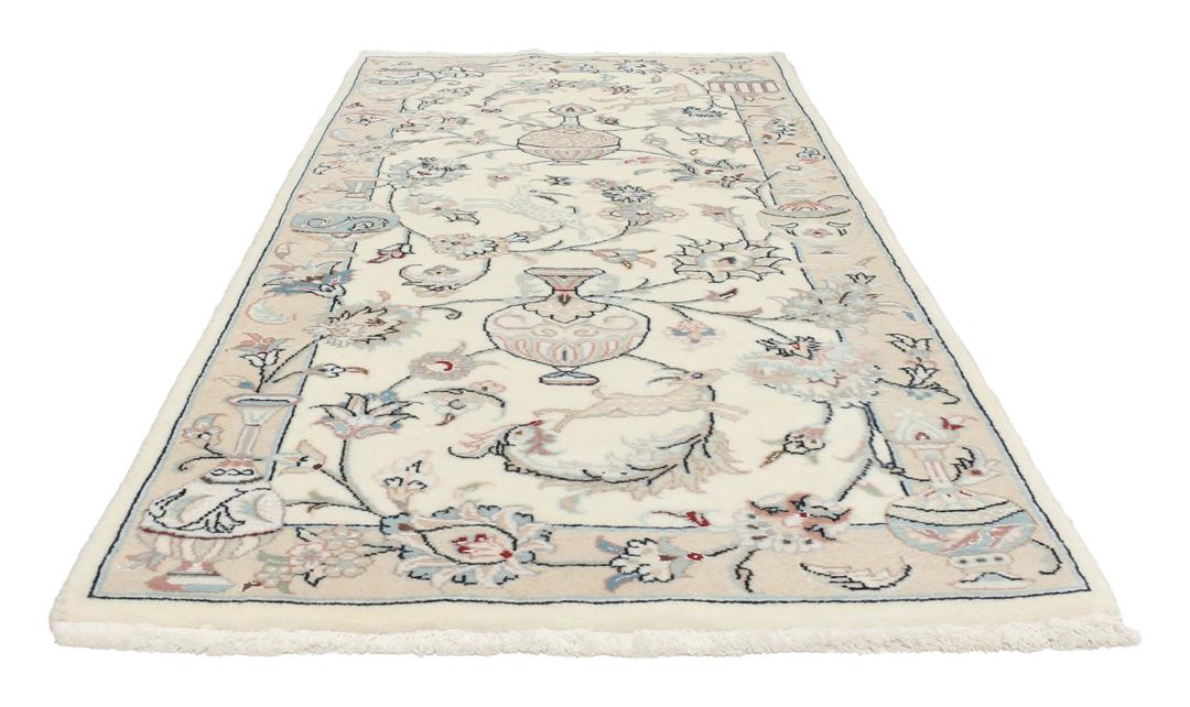 Hand-knotted Nain 9La rug from the Middle East in a soft beige colour with floral patterns