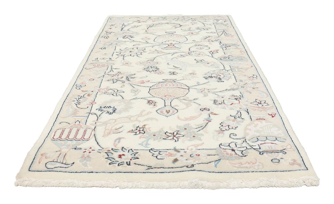 Hand-knotted Nain 9La rug from the Middle East in a soft beige colour with floral patterns
