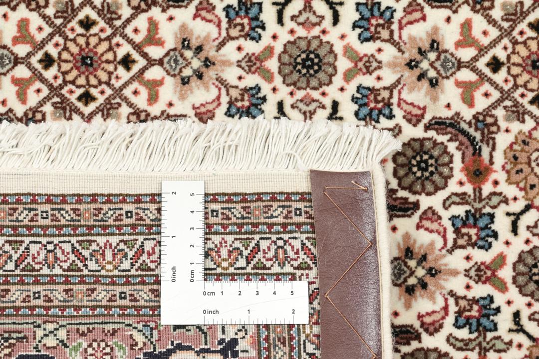Håndknyttet Tabriz 50 Raj-tæppe fra Mellemøsten med et blomstermønster i flere farver