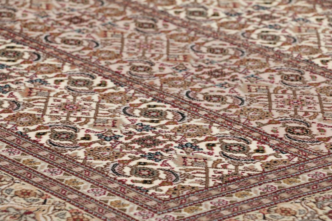 Håndknyttet Tabriz 50 Raj-tæppe med indviklede blomstermønstre i beige og røde nuancer