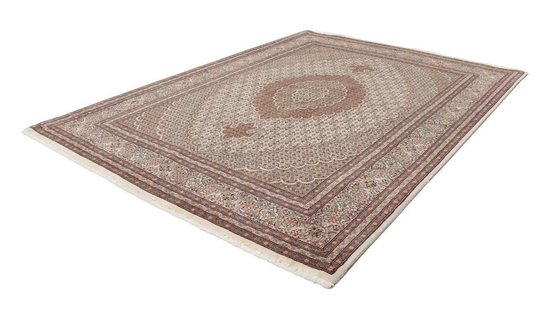 Handgeknoopt Tabriz-tapijt met ingewikkelde medaillonpatronen in meerkleurige tinten.