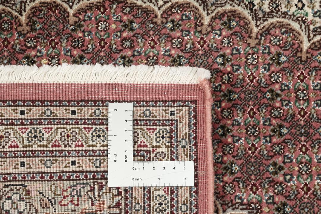 Håndknyttet mellemøstligt Tabriz 50 Raj tæppe i røde og beige nuancer