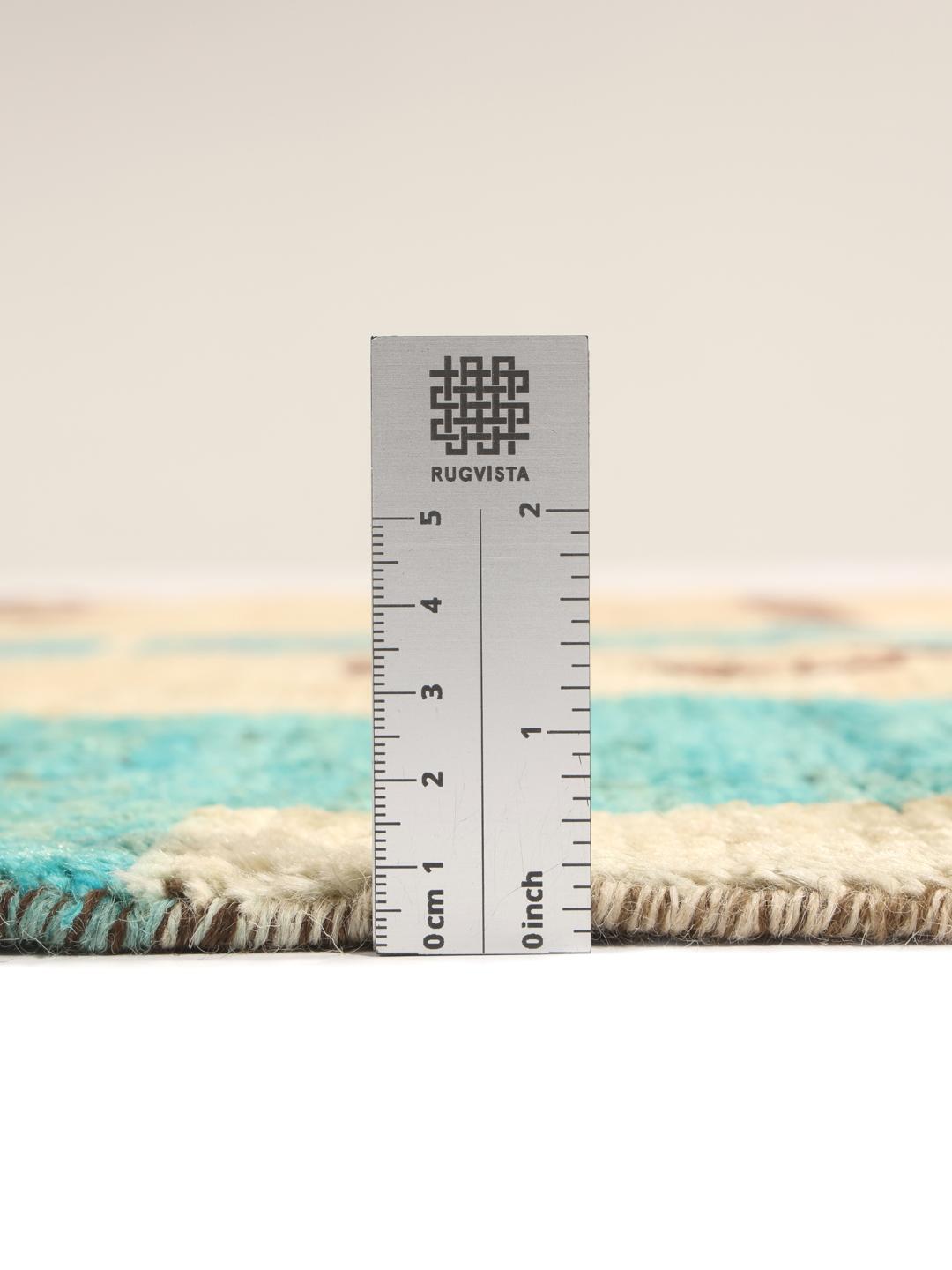 Tapis noué à la main au Moyen-Orient avec un motif artistique vibrant bleu sarcelle et beige