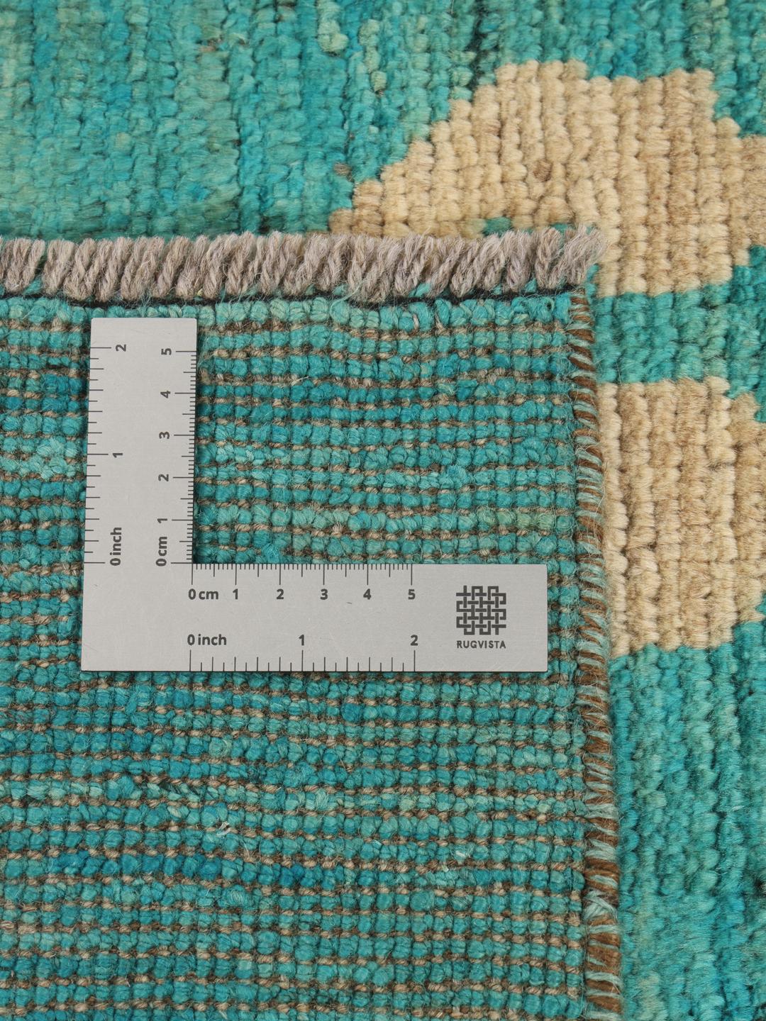 Tapis noué à la main au Moyen-Orient avec un motif artistique vibrant bleu sarcelle et beige