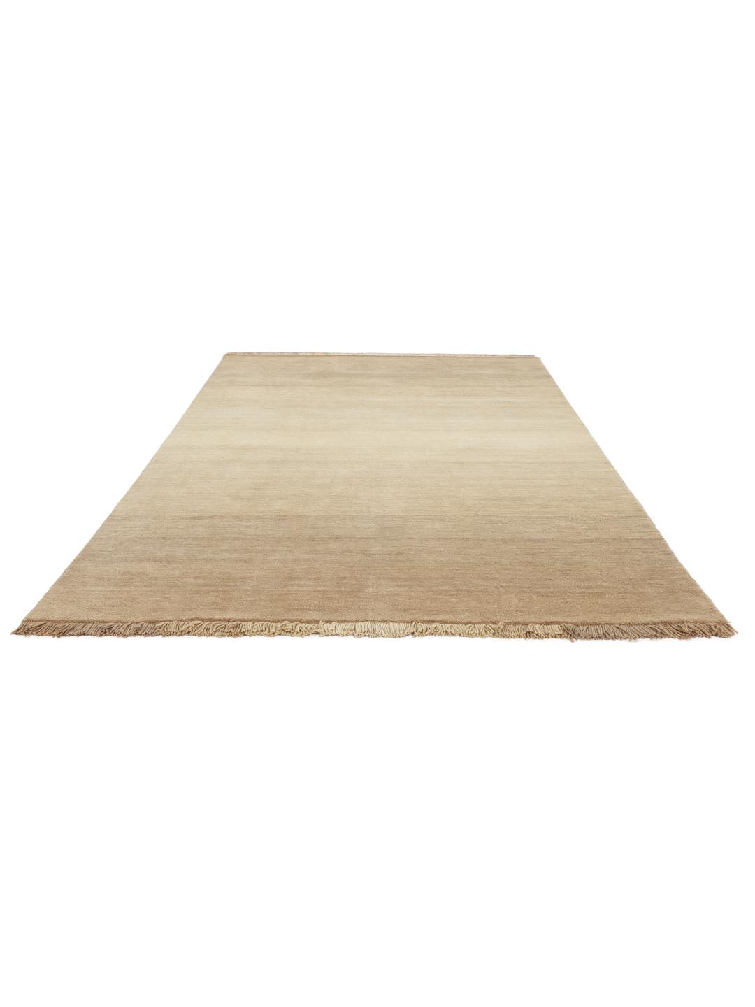 Beige håndvævet uldtæppe