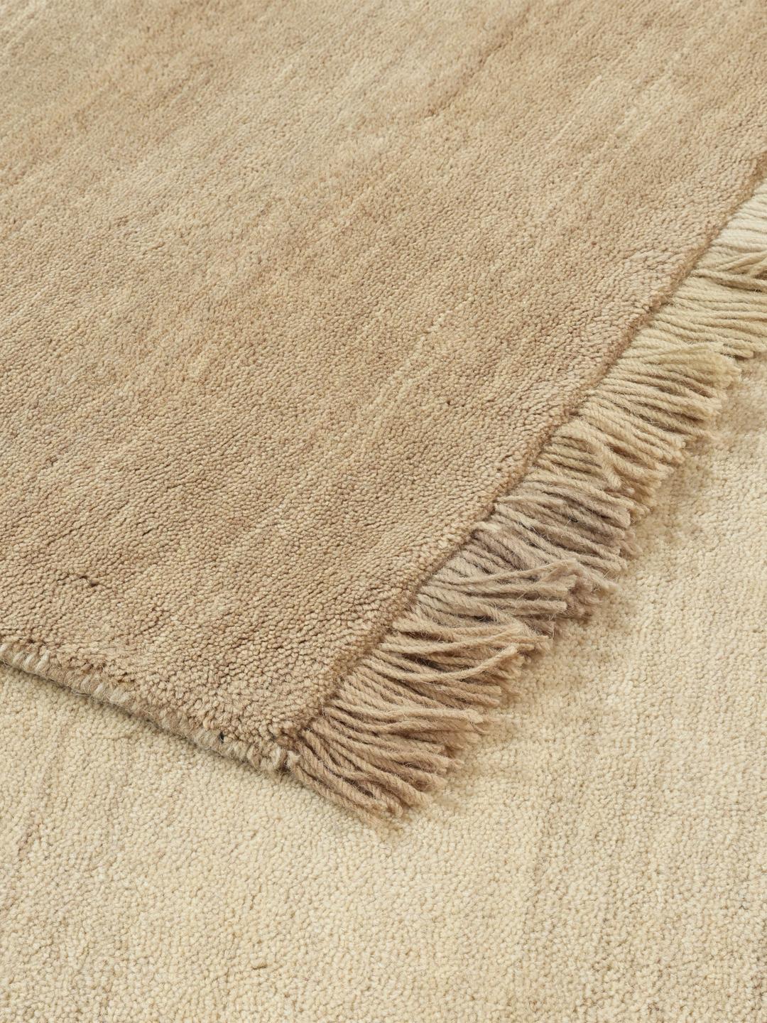 Beige håndvævet uldtæppe
