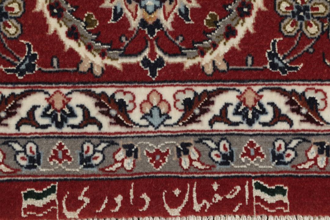 Håndknyttet Isfahan-tæppe fra Mellemøsten med mørkerødt medaljon og blomstermønstre
