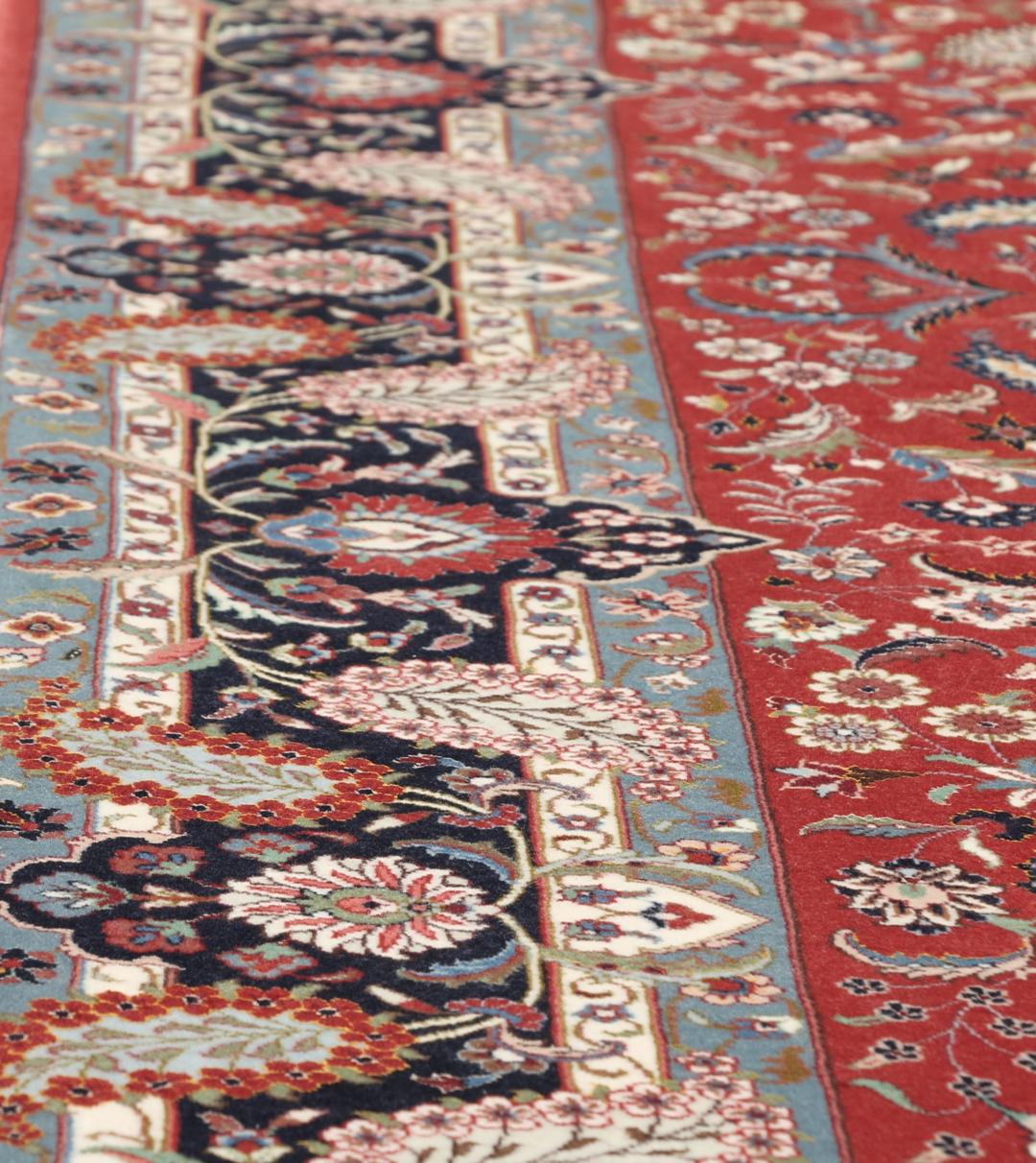 Handgeknoopt Ilam Sherkat Farsh tapijt met verfijnde bloemmotieven in rood en zwart
