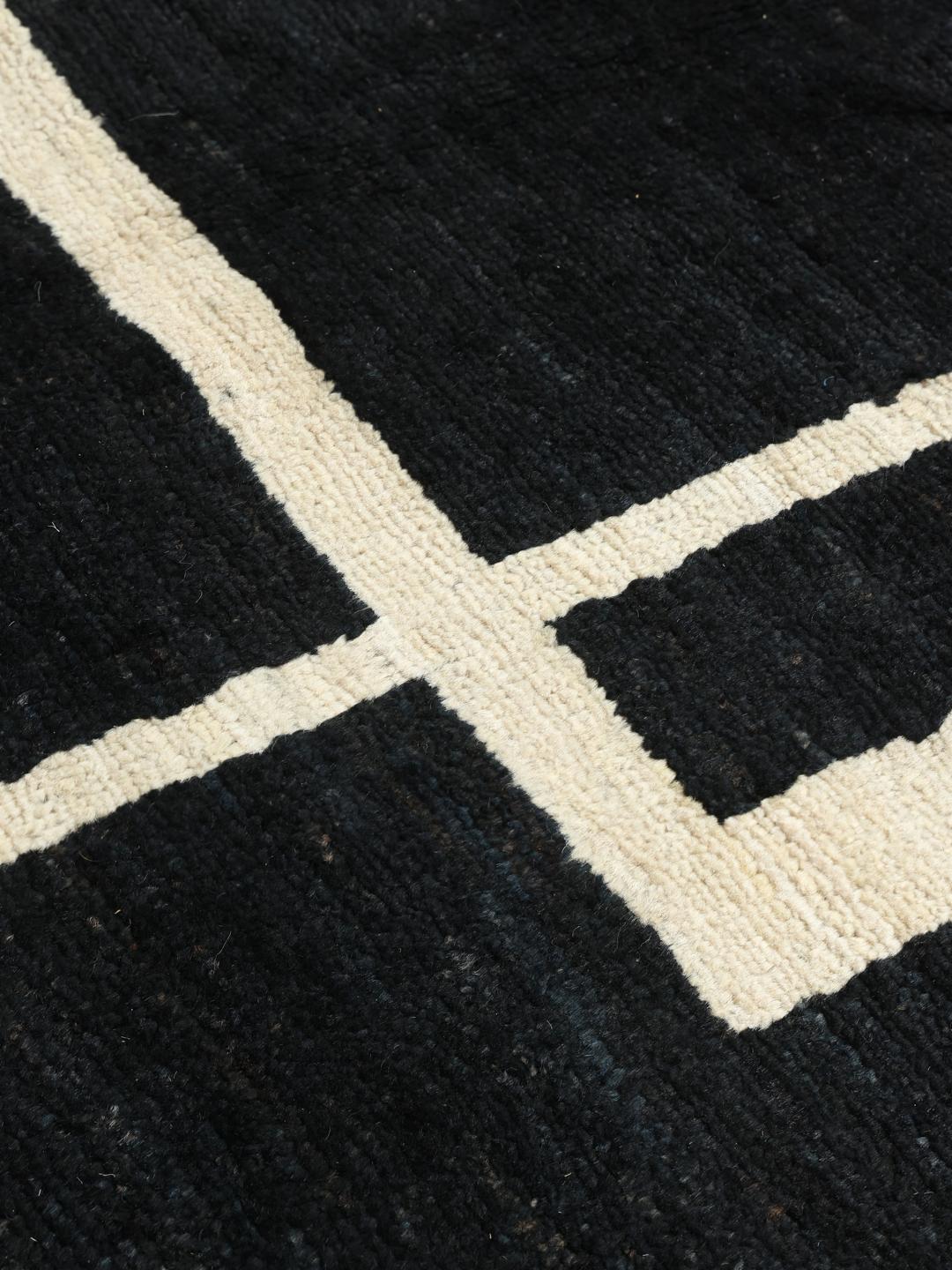 Modern Afghaans handgeknoopt tapijt met geometrisch zwart-wit ontwerp