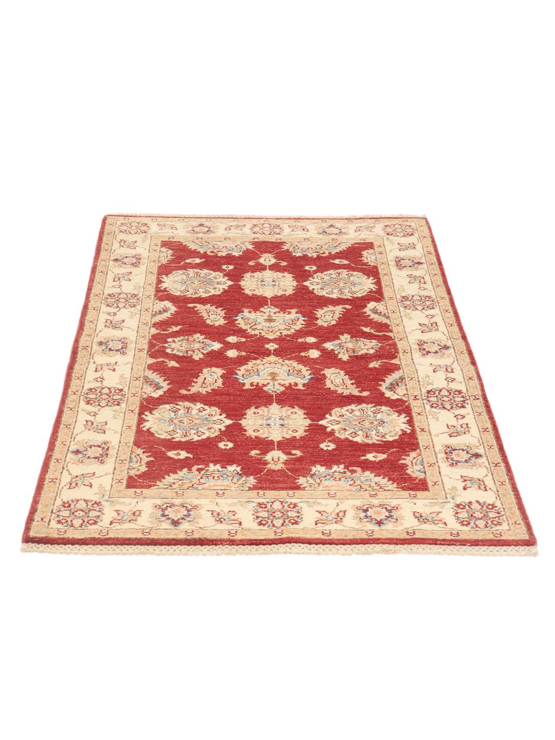 Hand-knotted Afghan rug with a red field and traditional floral patterns