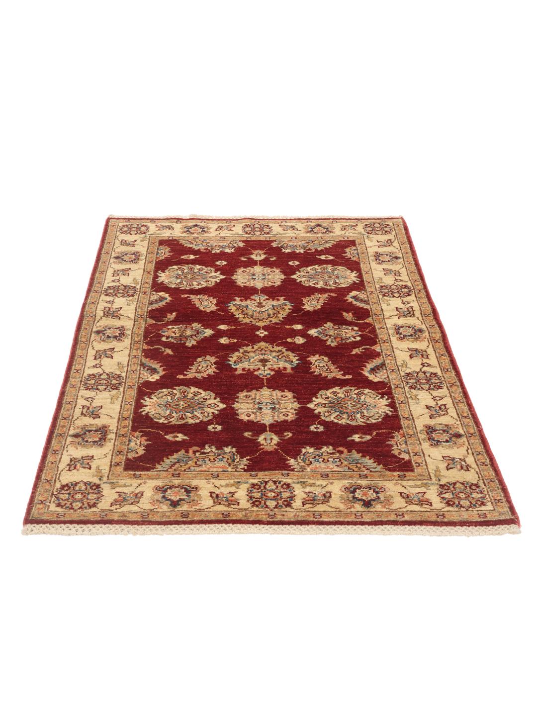 Hand-knotted Afghan rug with a red field and traditional floral patterns
