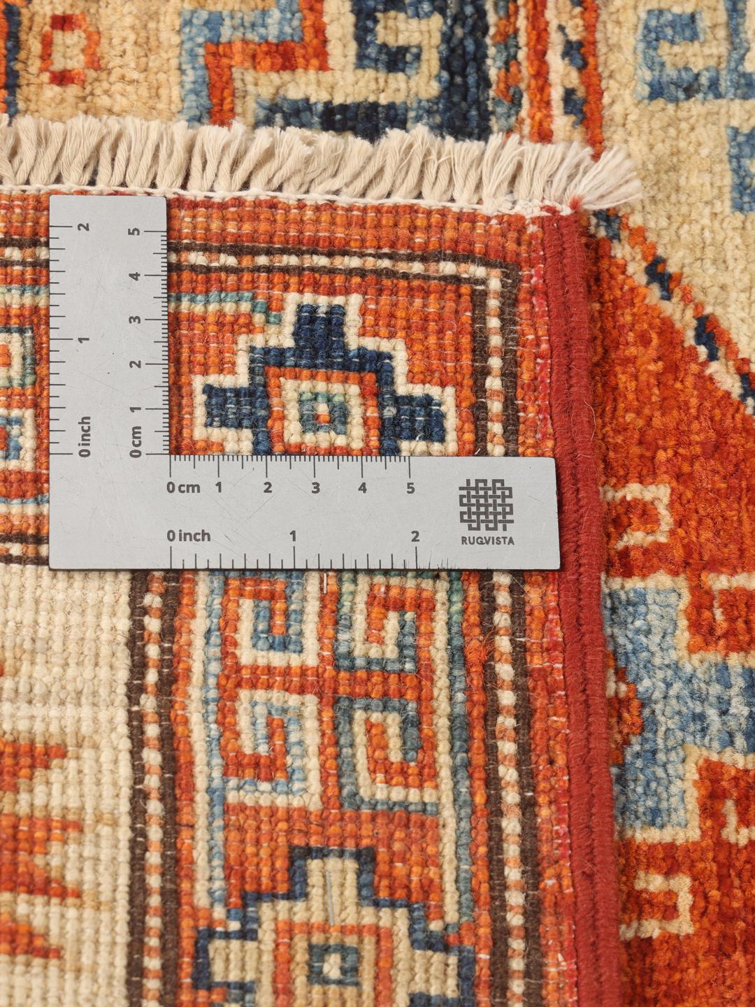 Tapis afghan Kazak noué à la main avec un champ orange et des motifs géométriques