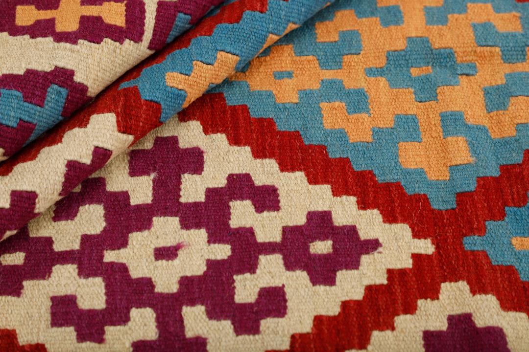 Håndvævet Kilim-tæppe fra Mellemøsten med et farverigt geometrisk diamantmønster