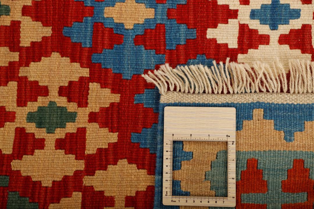 Hand-woven Kilim rug from the Middle East with geometric patterns in multicolor Wool.