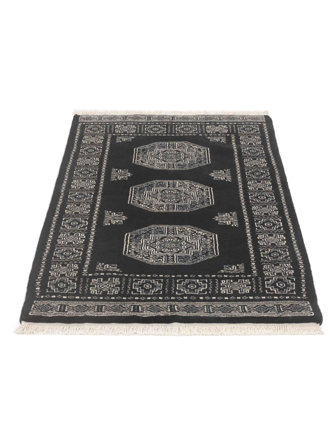 Hand-knotted Pakistan Bokhara rug in black with traditional geometric motifs