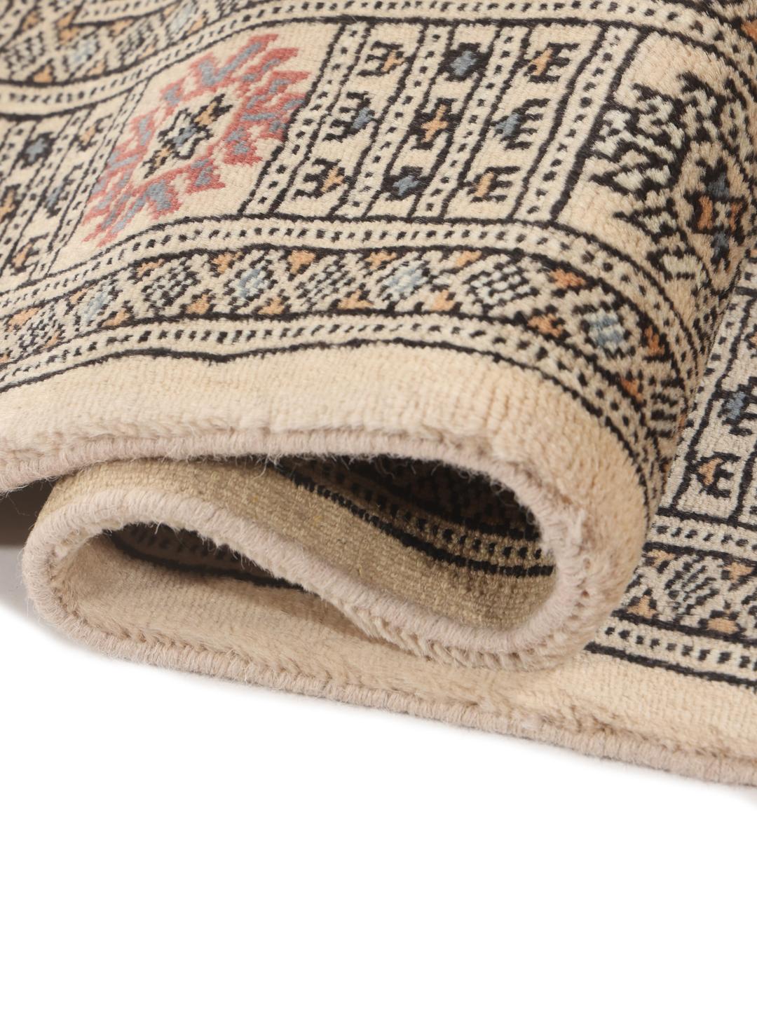 Hand-knotted Pakistan Bokhara 3ply rug in beige with traditional geometric motifs