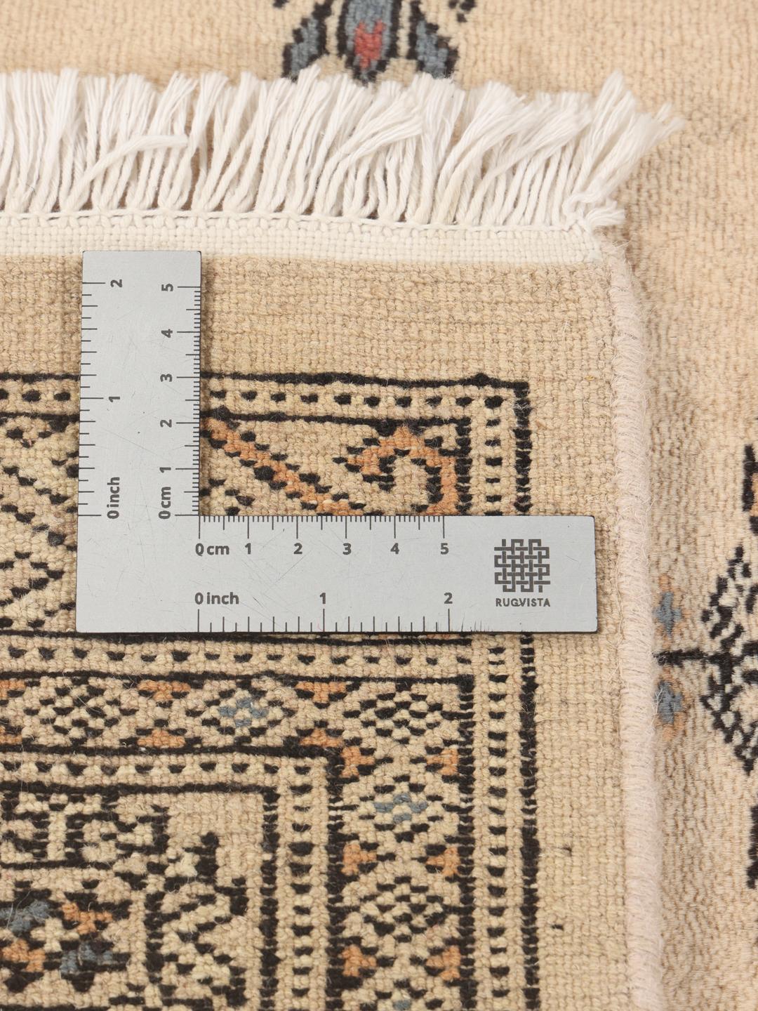 Hand-knotted Pakistan Bokhara 3ply rug in beige with traditional geometric motifs