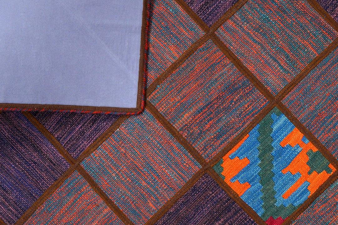 Tapis patchwork turc tissé à la main dans des tons multicolores vibrants