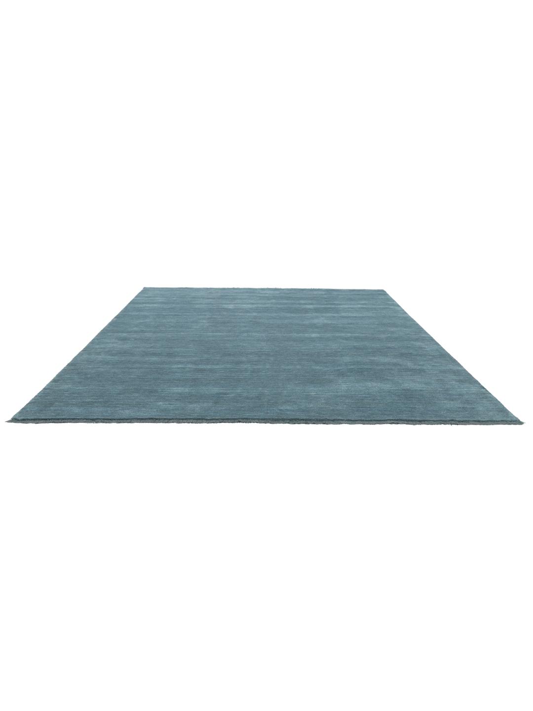 Tapis tissé à la main bleu canard foncé avec de courtes franges