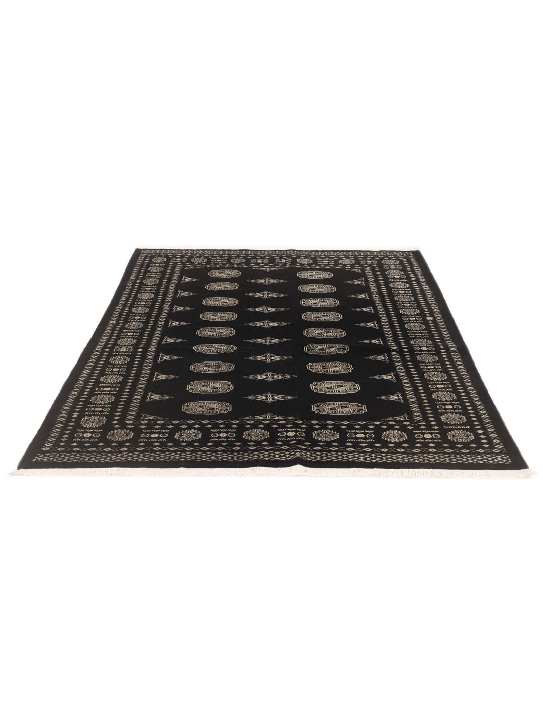 A hand-knotted Pakistan Bokhara rug in black with detailed geometric motifs.