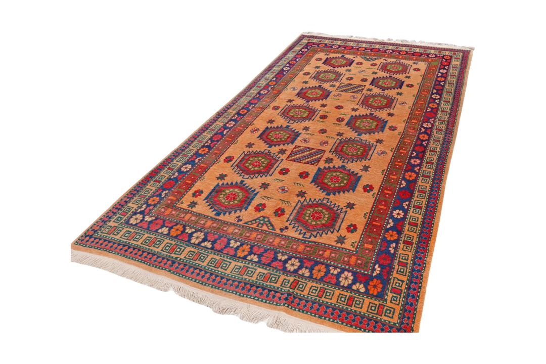 Antique Samarkand rug from China with a beige field and geometric medallions