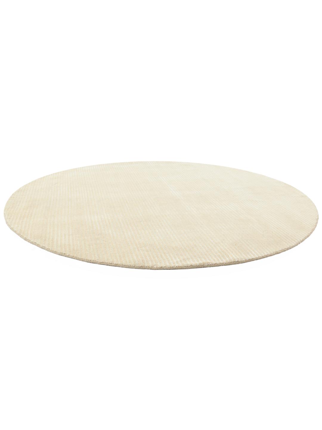 Un tapis rond beige avec un motif à fines rayures