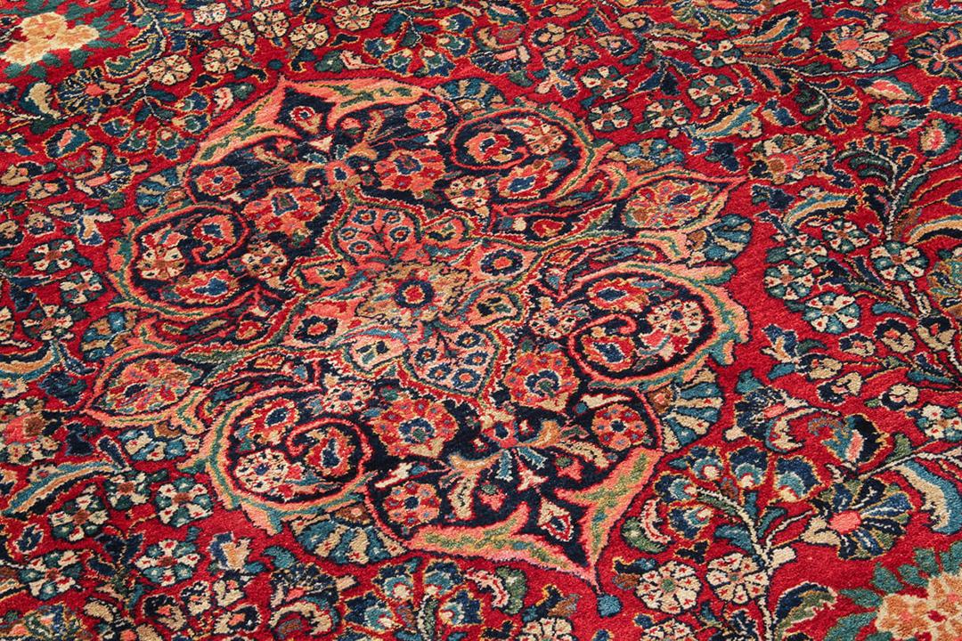 Handmade red Sarough antique rug from Persia