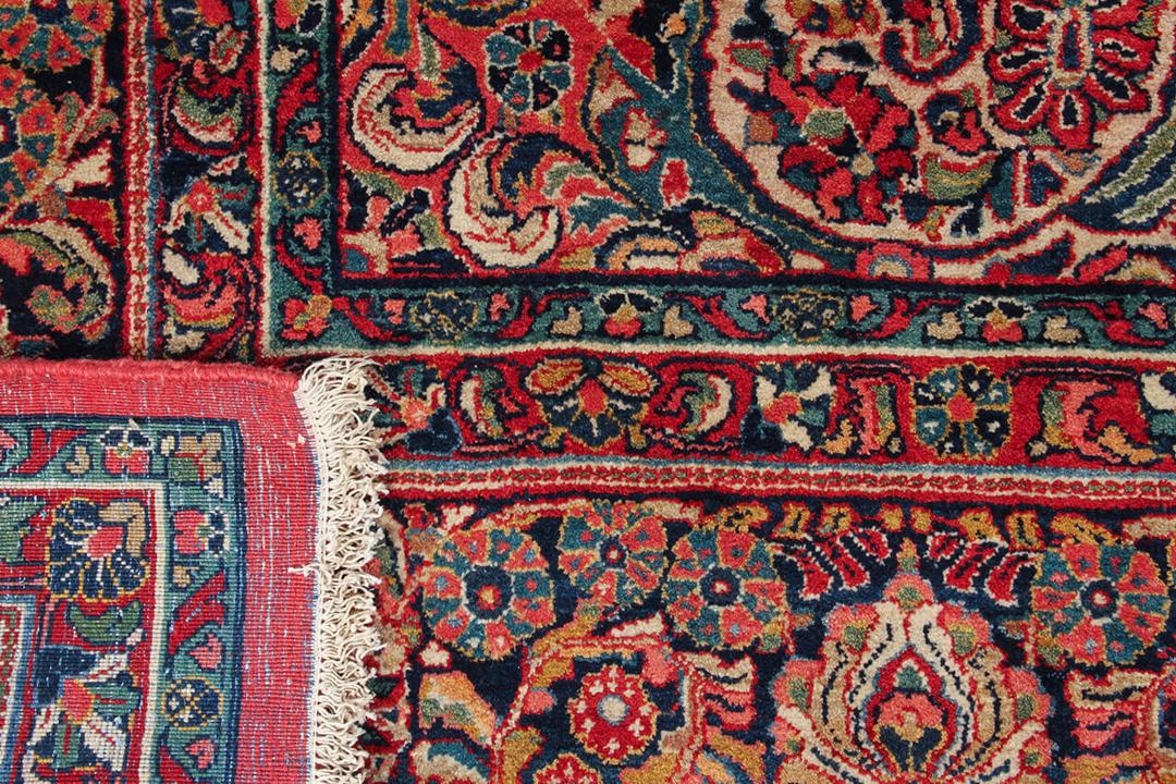 Handmade red Sarough antique rug from Persia