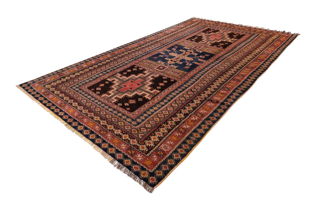 Vintage handgeknüpfter marokkanischer Teppich mit geometrischen Stammesmotiven in mehrfarbiger Wolle