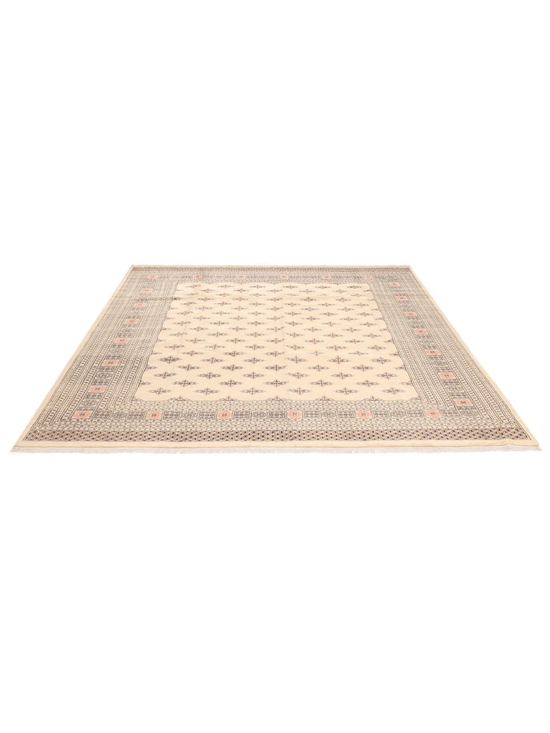 Handgeknoopt beige wollen tapijt uit Pakistan met traditionele patronen