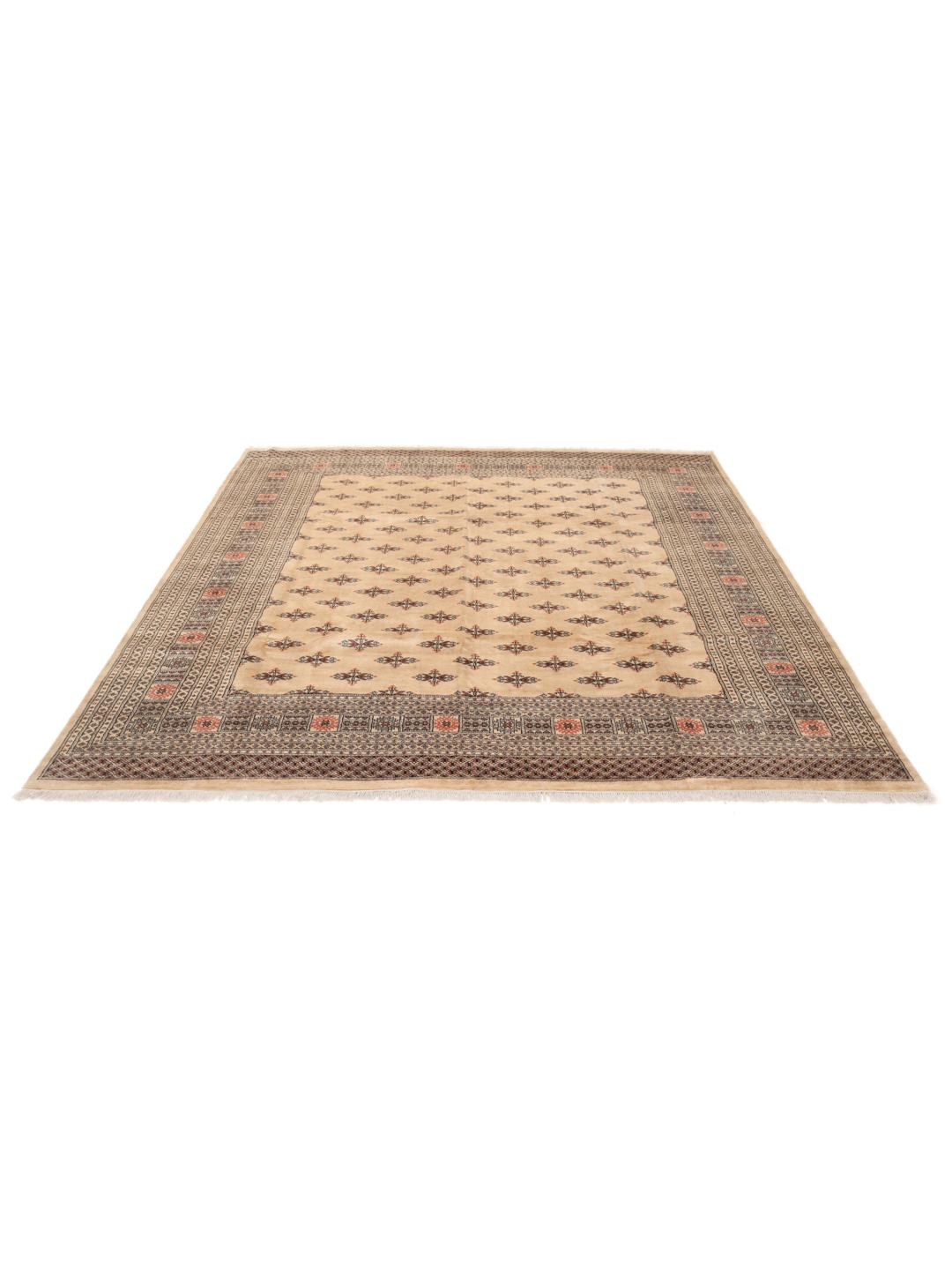 Handgeknoopt beige wollen tapijt uit Pakistan met traditionele patronen