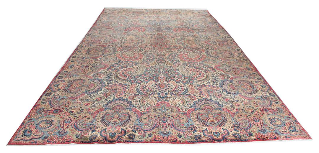 Handmade rug from Persia in beige and dark-red