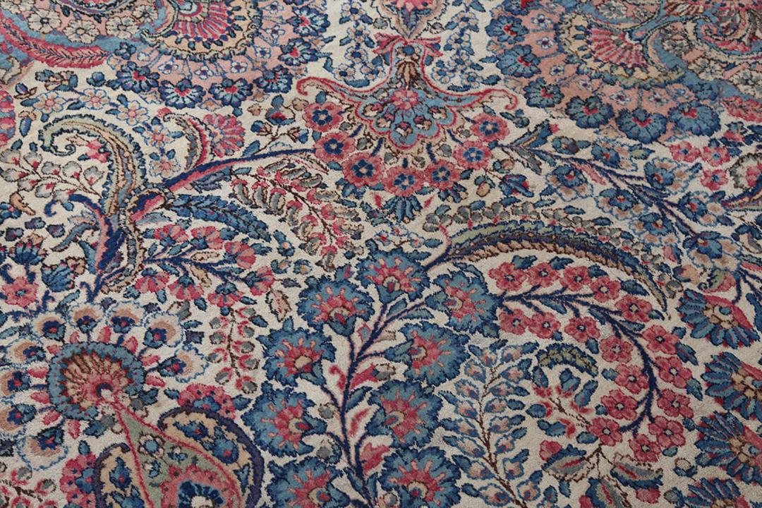 Handmade rug from Persia in beige and dark-red