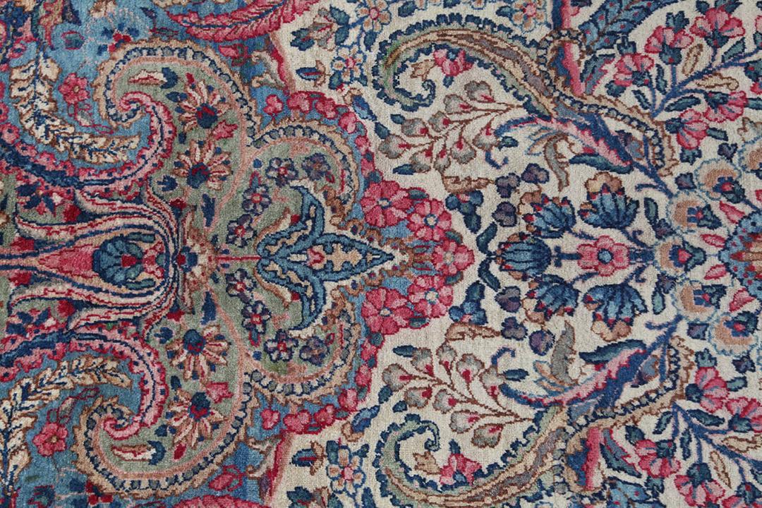 Handmade rug from Persia in beige and dark-red
