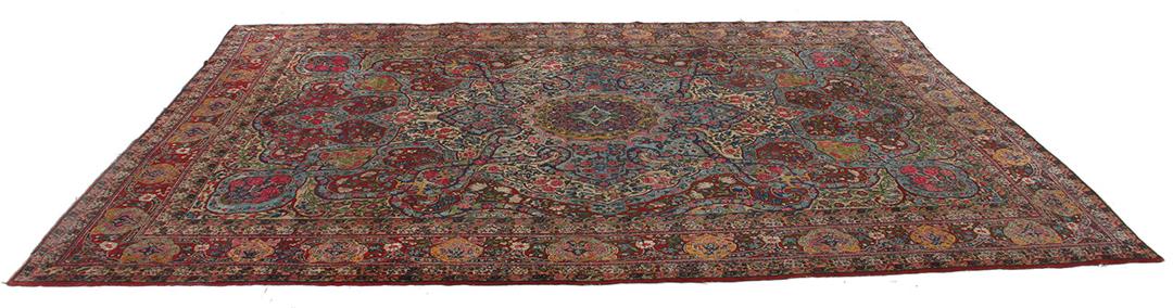 Handgeknoopt tapijt uit het Midden-Oosten in rood en blauw met bloemenmedaillonpatroon