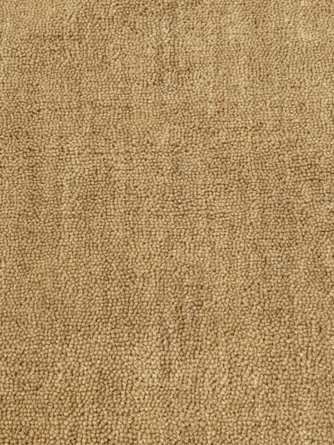 Beige runner rug with short fringes